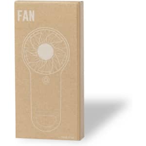 A compact fan in packaging, featuring a circular design with a logo, primarily in brown and white colours.