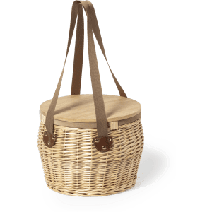 A woven picnic basket in natural tones with a wooden lid and brown straps. It features leather accents and a branded logo.