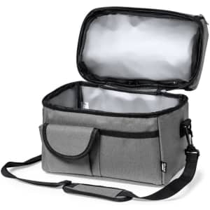 A grey cooler bag with a zippered top and an adjustable strap, featuring an outer pocket and insulated interior.
