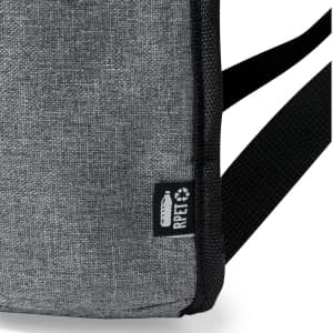 A grey cooler bag backpack with a textured fabric and a logo. It features adjustable straps for carrying.