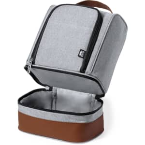 A grey cooler bag with a brown base, featuring a zippered opening and an interior lining. It has a logo on the front.