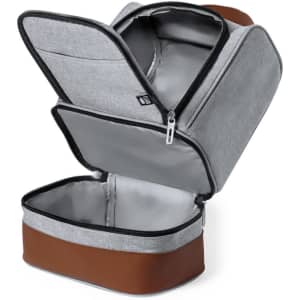 A grey cooler bag with a brown base, featuring a zippered opening and insulated interior. It has a branded logo.