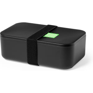 A black lunch box with a green accent and a black elastic strap. It features a simple, sleek design and a logo.