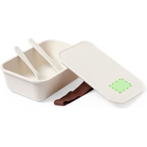 A cream-coloured lunch box with a lid, featuring two compartments and a brown strap. It has a logo on the side.