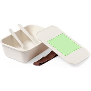 A beige lunch box with a green lid and a brown strap, featuring two compartments and a flat top for easy storage.