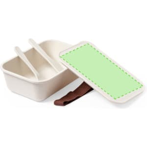 A cream lunch box with a green lid and brown strap, featuring two separate compartments and a removable lid.