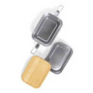 A set of two stainless steel lunch containers with a bamboo lid, arranged neatly on a white background.
