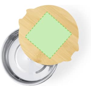 A round lunch box with a stainless steel base and a natural bamboo lid featuring a green square design.