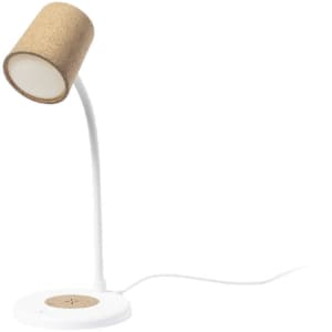 A multifunction lamp with a cork shade and white base, featuring a wireless charging pad.
