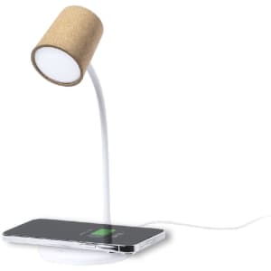 A multifunction lamp with a cork shade and a white stand, featuring a wireless charging base for smartphones.