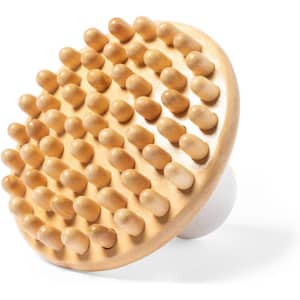 A wooden massager with rounded pins, featuring a white handle, designed for personal health use.