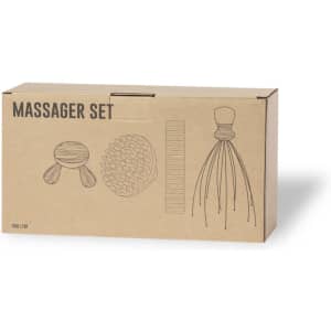 A brown cardboard box containing a massager set with various massage tools and a branded logo.