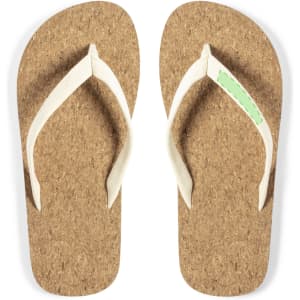 A pair of cork flip flops with white straps and a green accent, featuring a logo on the side.
