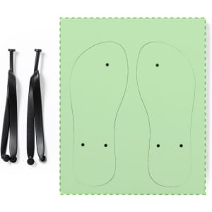 Black flip flop straps alongside green flip flop soles, with a design outline on the soles. The image includes a logo.