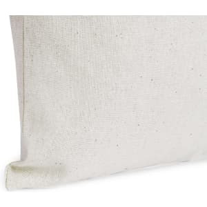 A cream-coloured tote bag with a textured surface, featuring a branding logo.