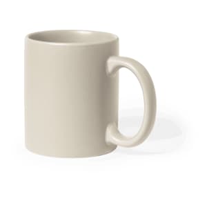 A coffee mug in a light beige colour with a simple, rounded handle and a smooth finish.