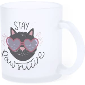 A frosted glass mug featuring a cat with heart-shaped sunglasses and the text "Stay Pawsitive."