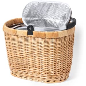 A woven, natural-coloured picnic basket with a silver insulated interior and a hinged lid. It has a sturdy handle.