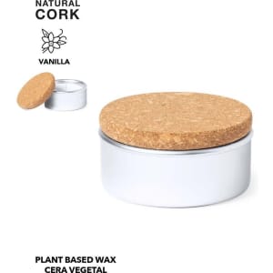 A white candle in a metal tin with a natural cork lid, featuring a vanilla scent.