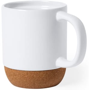 A white mug with a cork base, featuring a simple design and a sturdy handle.