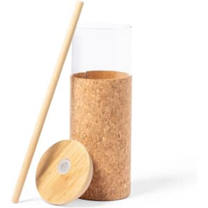 A glass cup with a cork base, wooden lid, and a bamboo straw, featuring a sleek and modern design.