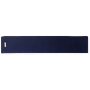 A long navy Kinar Scarf with a small logo tag on one end, featuring a smooth texture.