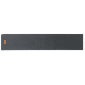A long rectangular Kinar Scarf in a dark grey colour with a small logo.