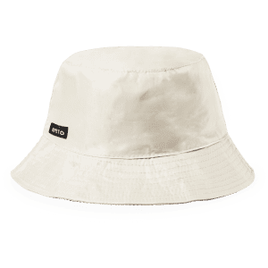 A beige reversible hat with a wide brim and a branded logo, suitable for outdoor wear.