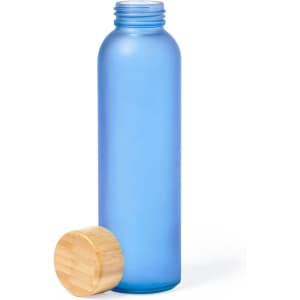 A drink bottle in a frosted blue colour with a wooden lid placed beside it. It features a simple design and a branding logo.