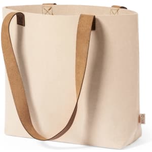 A cream tote bag with brown leather straps and a simple design, featuring a branding logo.