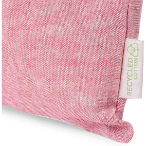 A red folded bag made from recycled cotton, featuring a small tag indicating its eco-friendly material.
