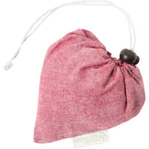 A red foldable bag in the shape of a heart, secured with a drawstring, featuring a label indicating recycled cotton.