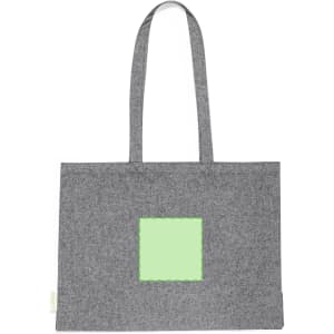 A grey tote bag with two handles featuring a green square patch. It has a logo on one side.