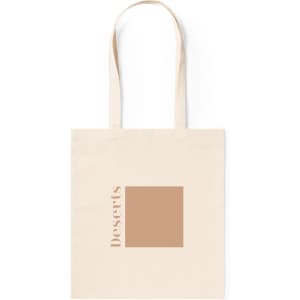 A beige tote bag with a square graphic and the word "Deserts." It has two sturdy handles and a minimal design.