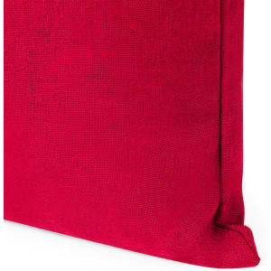 A vibrant red tote bag with a textured surface and a logo on the side.
