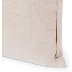 A beige tote bag with a textured fabric finish and a prominent seam. The bag features a logo.