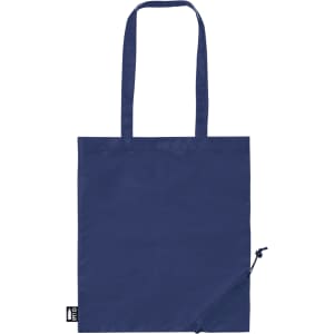 A blue foldable reusable grocery bag with two shoulder straps and a small pouch for storage. It features a logo.