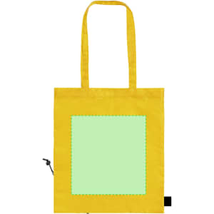 A yellow foldable reusable grocery bag with a blank green square in the centre and two handles.