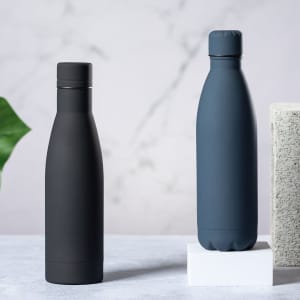 A drink bottle set featuring a matte black bottle and a matte navy bottle, both with sleek designs and a logo.