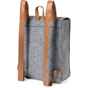 A grey felt backpack with brown leather straps and a simple design, featuring a logo.