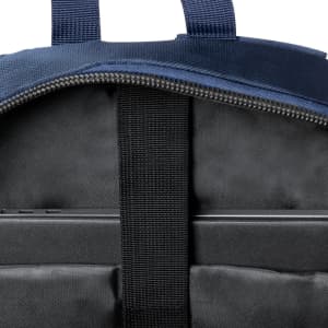 A navy blue Luffin Backpack interior featuring a padded section, zip closure, and straps for secure storage.