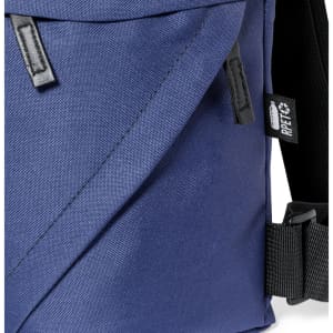 A navy blue backpack featuring various straps and a logo tag. The fabric has a textured appearance.