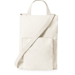A cream laptop pouch featuring a shoulder strap and a front pocket, with a logo visible.