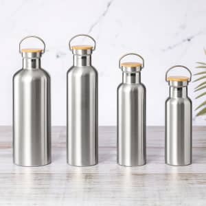 A drink bottle set featuring four stainless steel insulated bottles with wooden lids, varying in height.