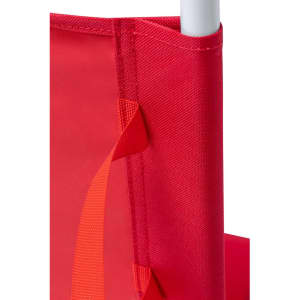 Close-up of a red fabric section of the Coswel Chair, featuring a distinct logo and sturdy stitching.