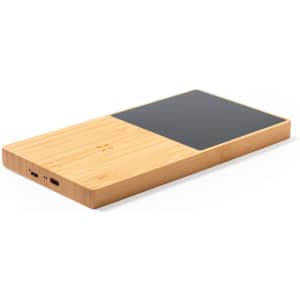 A wooden wireless charger with a smooth black top surface and ports on the side. It features a logo.