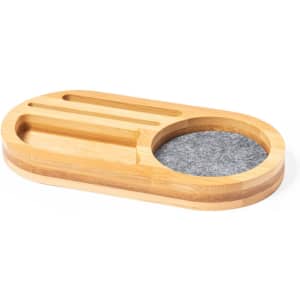 A bamboo organiser with a grey felt section and multiple slots for holding office items.