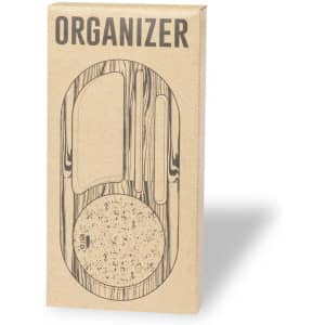 A wooden-style organiser in a cardboard box, featuring multiple compartments and a circular section for storage.