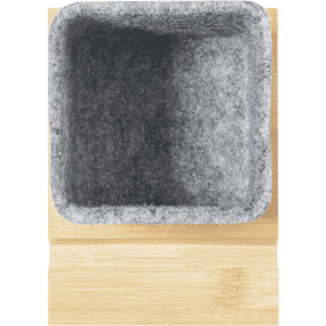 A square grey felt pencil holder sits atop a light wood base, featuring a simple and modern design.