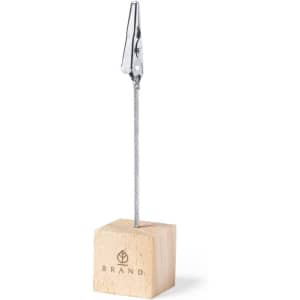 A wooden block with a silver clip attached to a metal wire, featuring a logo on the block.